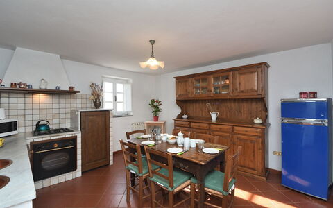 Villa Antelminelli: Property, Furniture, Cabinetry, Table, Wood, Chair, Interior Design, Kitchen, Building, Flooring