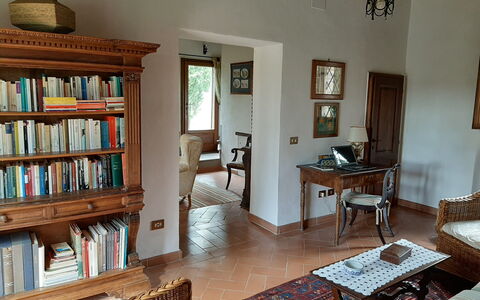 Casa Banditello: Furniture, Property, Picture Frame, Bookcase, Shelf, Wood, Blue, Table, Interior Design, Lighting