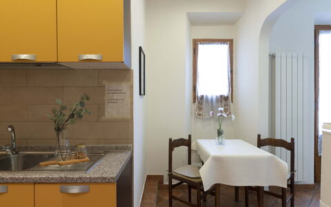 Vintage Apartment in Florence: Property, Furniture, Cabinetry, Building, Interior Design, Countertop, Yellow, Table, Floor