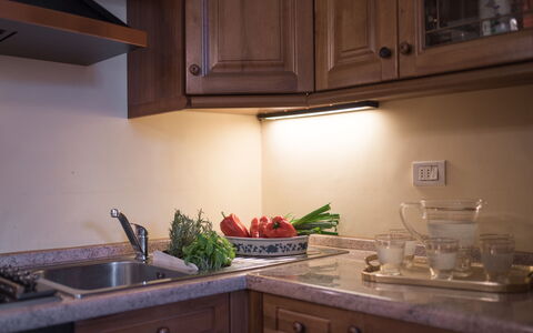 Duomo Suite: Countertop, Cabinetry, Property, Kitchen Sink, Food, Sink, Kitchen, Kitchen Stove, Kitchen Appliance, Wood