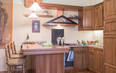 Duomo Suite: Furniture, Property, Cabinetry, Countertop, Building, Wood, Lighting, Interior Design, Table, Floor