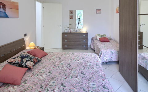 Apartment Fernanda 2 - Levanto: Furniture, Cabinetry, Comfort, Bed Frame, Drawer, Building, Wood, Chest Of Drawers, Floor, Flooring