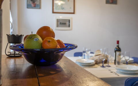 Il Borgo Apartment: Table, Tableware, Dishware, Picture Frame, Food, Wood, Fruit, Interior Design, Plate, Serveware