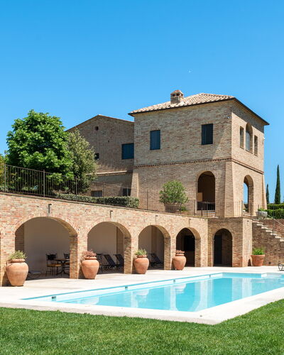 Podere D'Asso: Plant, Sky, Building, Water, Tree, Grass, House, Landscape, Residential Area, Leisure