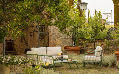 Villa Pianoia: Plant, Furniture, Nature, Building, Table, Lighting, Architecture, Outdoor Furniture, Chair, Wall