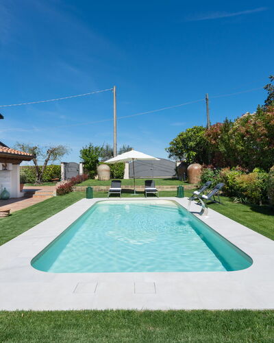 Villa Di Pillo: Plant, Sky, Water, Property, Tree, Leisure, Cloud, Swimming Pool, Grass, Residential Area