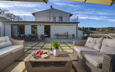 Bella Di Panzano: Furniture, Sky, Table, Property, Couch, Cloud, Interior Design, Outdoor Furniture, Shade, Living Room