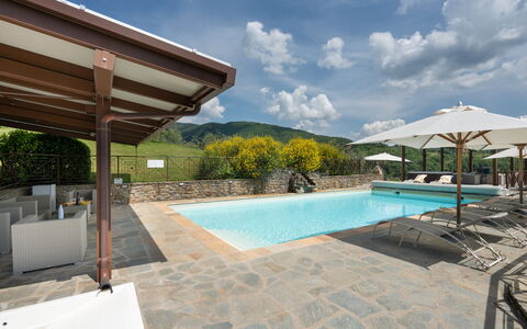 Villa Castelluccio - Arezzo, Toscana: Water, Cloud, Sky, Swimming Pool, Plant, Outdoor Furniture, Shade, Sunlounger, Leisure, Tree