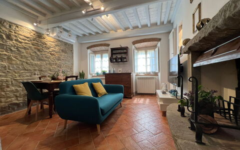 Casa Del Borgo: Furniture, Couch, Plant, Table, Picture Frame, Houseplant, Interior Design, Living Room, Studio Couch, Floor