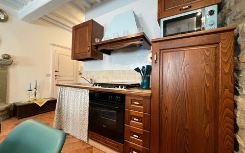 Casa Del Borgo: Cabinetry, Furniture, Property, Countertop, Drawer, Kitchen, Kitchen Stove, Wood, Home Appliance, Kitchen Appliance