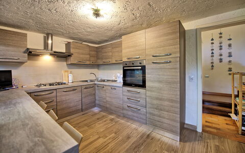 Le Dune: Cabinetry, Property, Countertop, Kitchen, Interior Design, Wood, Home Appliance, Kitchen Stove, Kitchen Appliance, Floor