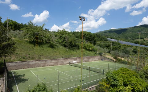 Villa Olivi - Subbiano, Toscana, Pool And Nature: Cloud, Sky, Land Lot, Sports Equipment, Fence, Grass, Leisure, Landscape, Tree, Tennis Court