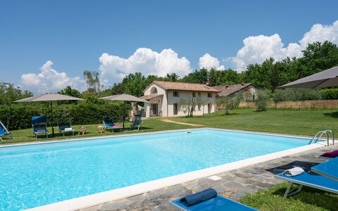 Villa Le Selve: Water, Cloud, Sky, Plant, Property, Swimming Pool, Azure, Blue, Building, Tree