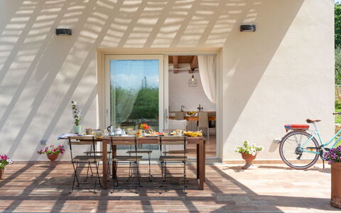 Villa Le Selve: Bicycle, Wheel, Property, Furniture, Plant, Table, Bicycle Wheel, Wood, Flower