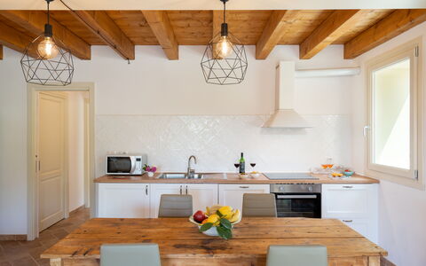 Villa Le Selve: Cabinetry, Countertop, Property, Kitchen, Kitchen Sink, Sink, Wood, Interior Design, Window, Orange