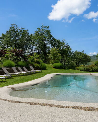 Villa Torre delle Rose by Geco Vacation Rentals: Cloud, Water, Sky, Plant, Water Resources, Property, Natural Landscape, Tree, Swimming Pool, Landscape
