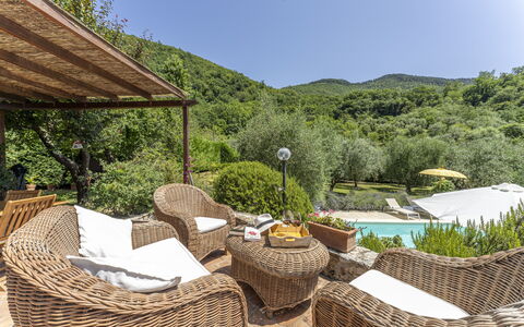 Fienile Di Fabio - Colline Fiorentine Vaiano, Tosc: Sky, Plant, Property, Plant Community, Furniture, Tree, Outdoor Furniture, Natural Landscape, Shade, Leisure