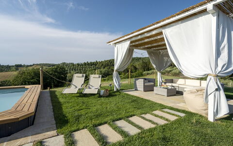 Villa Zara: Sky, Property, Plant, Cloud, Shade, Water, Tent, Land Lot, Grass, Leisure