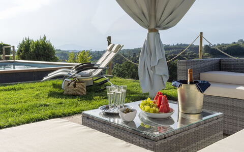 Villa Zara: Sky, Property, Table, Plant, Building, Outdoor Furniture, Food, Grass, Tree, Urban Design