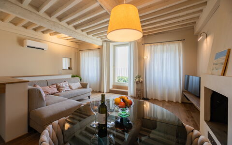 Casa Novecento: Table, Furniture, Property, Couch, Comfort, Interior Design, Wood, Picture Frame, Living Room, Architecture