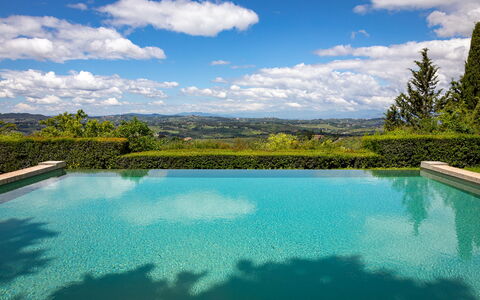 Castello Di Quarate: Water, Cloud, Sky, Water Resources, Swimming Pool, Natural Landscape, Azure, Plant, Tree, Rectangle