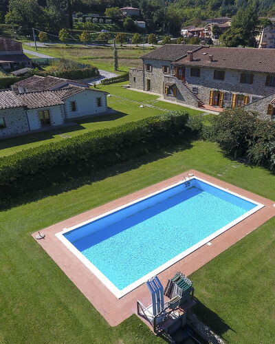 Villa Niccone: Building, Property, Plant, Land Lot, Swimming Pool, Window, Architecture, Urban Design, Vegetation, Grass
