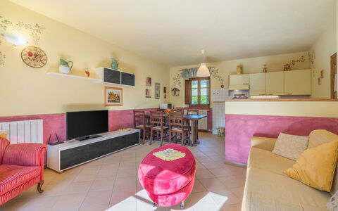 La Vecchia Fornace La Piastra Apartments - Abetone: Furniture, Picture Frame, Couch, Purple, Interior Design, Living Room, Pink, Flooring, Floor, Decoration