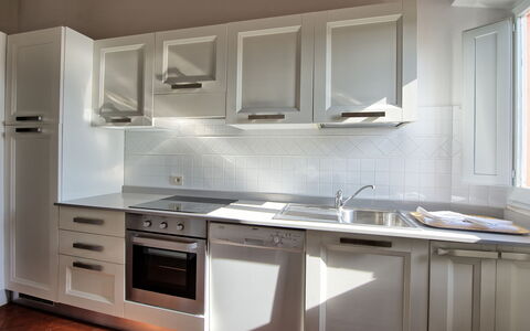 Villa Cona: Cabinetry, Kitchen Sink, Countertop, Sink, Tap, Building, Kitchen Stove, Kitchen, Wood, Interior Design
