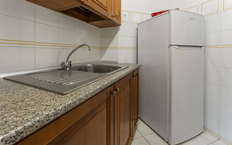 Argentario Giannella Apartment- Orbetello, Toscana: Cabinetry, Kitchen Sink, Tap, Countertop, Sink, Plumbing Fixture, Building, Kitchen, Wood, Interior Design