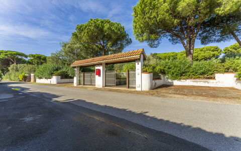 Giannella Apartment - Orbetello, Toscana: Sky, Cloud, Property, Plant, Road Surface, Tree, Asphalt, Shade, Land Lot, Neighbourhood