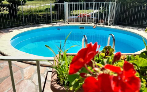 Podere Vallino: Water, Flower, Plant, Building, Swimming Pool, Flowerpot, Tree, Azure, Botany, Fence