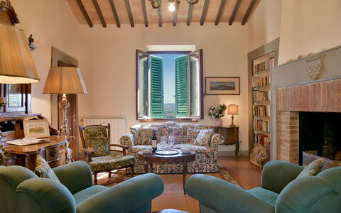 Torre Di Montelopio: Table, Furniture, Picture Frame, Property, Couch, Chair, Lighting, Architecture, Wood, Interior Design