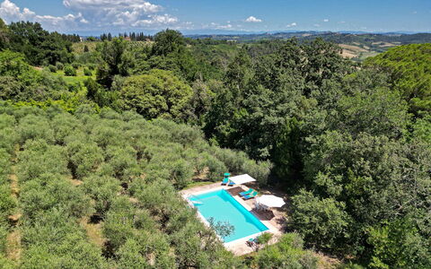 Torre Di Montelopio: Sky, Plant Community, Water, Cloud, Natural Landscape, Tree, Land Lot, Plant, Swimming Pool, Shrub