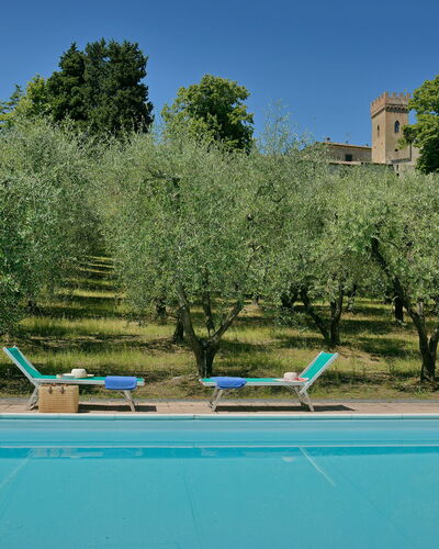 Torre Di Montelopio: Water, Plant, Sky, Swimming Pool, Azure, Outdoor Furniture, Tree, Body Of Water, Grass, Natural Landscape