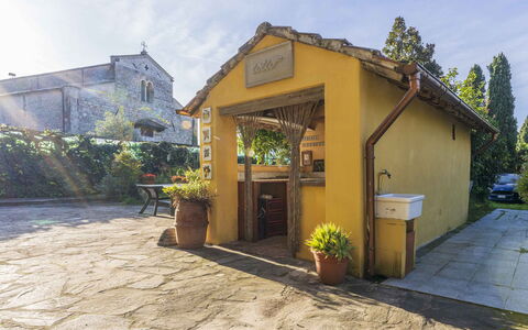 Casale Il Farro - Camaiore, Toscana: Plant, Sky, Building, Property, Cloud, Flowerpot, Tree, Door, Window, Shade