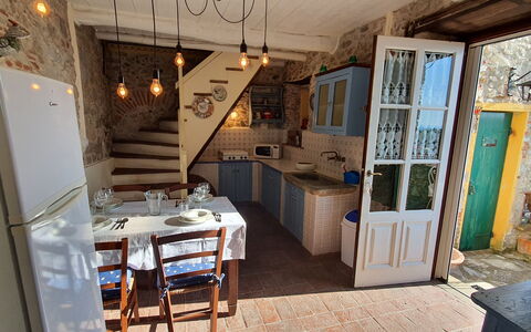 Borgo Bucatra Tramonto: Property, Table, Wood, Chair, Interior Design, Floor, Flooring, Kitchen, Door, Cabinetry