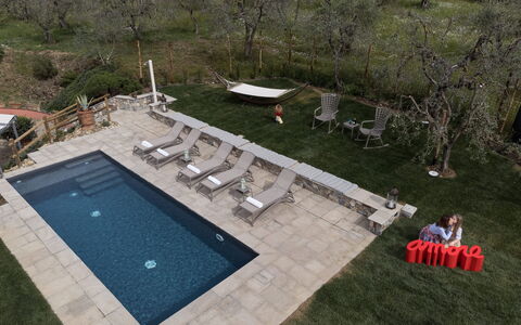 Villa Botinaccio: Water, Plant, Swimming Pool, Chair, Leisure, Grass, Tree, Outdoor Furniture, Recreation, Landscape