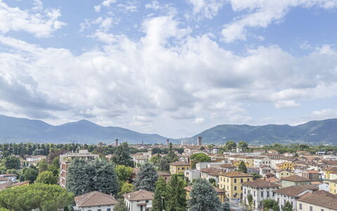 Lucca Old Town Apartment - Lucca, Toscana: Sky, Mountainous Landforms, Mountain, Hill, Residential Area, Town, Mountain Range, Cloud, Human Settlement, Hill Station