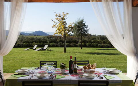 Villa Sant'andrea: Table, Plant, Furniture, Property, Sky, Window, Tableware, Leaf, Tablecloth, Shade