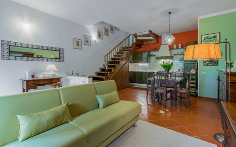 Casa Bellosguardo a Vinci: Couch, Property, Table, Furniture, Living Room, Lighting, Picture Frame, Interior Design, Floor, Flooring