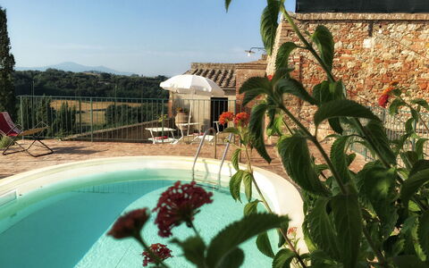 Casa Le Crete: Water, Plant, Sky, Building, Flower, Swimming Pool, Tree, Arecales, Window, Terrestrial Plant