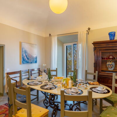 Sunset Sea View, Baratti, Populonia, Wifi, Ac: Table, Furniture, Picture Frame, Window, Interior Design, Wood, Yellow, Building, Chair, Real Estate