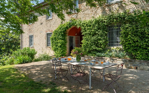 Casa Mirandola: Plant, Table, Furniture, Building, Property, Window, Chair, Outdoor Table, Outdoor Furniture, Shade