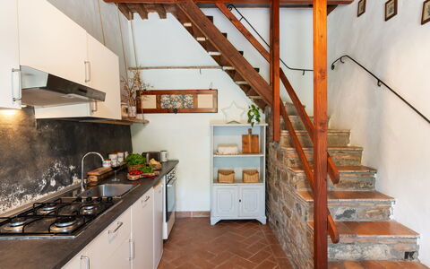 Villa Dei Tigli: Countertop, Cabinetry, Property, Stairs, Kitchen Appliance, Kitchen Stove, Wood, Kitchen, Flooring, Floor