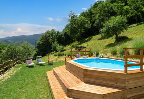 Villa Dei Tigli: Water, Plant, Sky, Swimming Pool, Tree, Cloud, Outdoor Furniture, Building, Natural Landscape, Shade