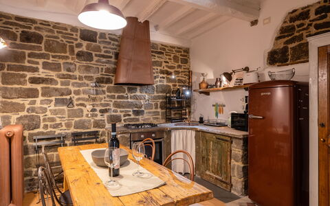 La Piccina: Cabinetry, Furniture, Property, Countertop, Table, Wood, Kitchen, Lighting, Kitchen Appliance, Interior Design