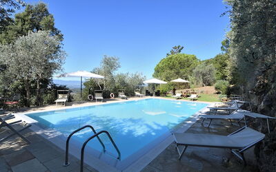 Villa Sette Ponti Levante: Plant, Sky, Property, Water, Swimming Pool, Table, Azure, Shade, Outdoor Furniture, Tree