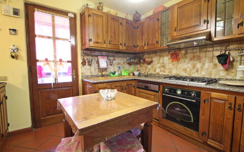 Villa La Rocca: Cabinetry, Countertop, Furniture, Kitchen, Wood, Kitchen Appliance, Home Appliance, Building, Table, Interior Design