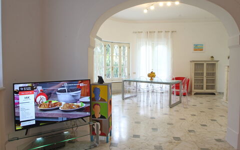 Villa Le Macchie: Building, House, Window, Table, Hall, Wood, Flooring, Home Appliance, Art, Kitchen