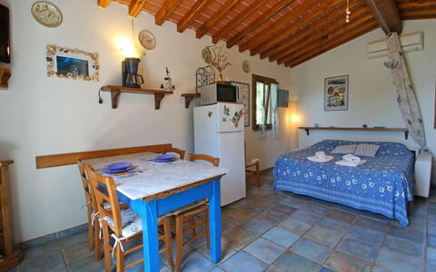 La Casetta: Furniture, Building, Table, Azure, Blue, Wood, House, Interior Design, Picture Frame, Floor